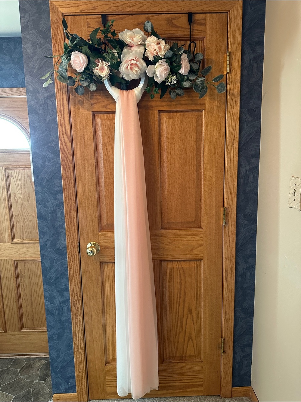 24" Floral Swag with blush roses with blush and white fabric drop on wire ring